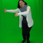 Judy in front of the green screen.