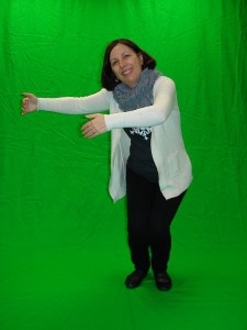 Judy in front of the green screen.