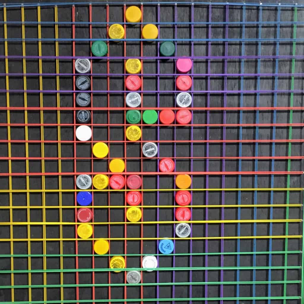 Letter 'S' made on bottle-cap mosaic design