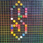 'S' bottle cap mosaic design