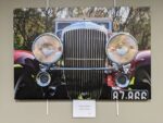 photograph on canvas featuring the front grill of a 1930 Dusenberg automobile