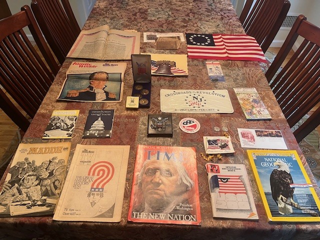 Table with memorabilia from the U.S. Bicentennial