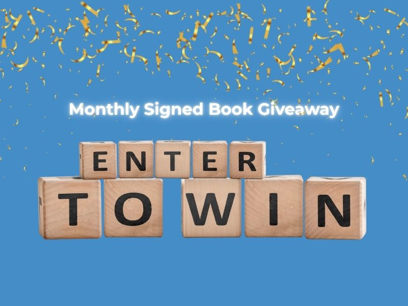 Enter to Win spelled out in wood blocks for monthly signed book giveaway