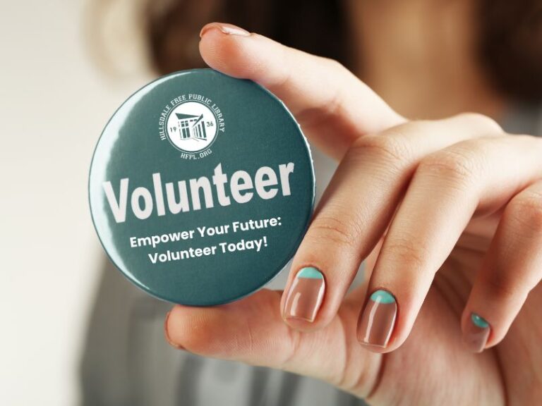 Hand holding a button with an HFPL logo and reads, Volunteer - Empower Your Future, Volunteer Today!